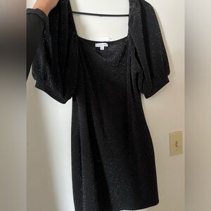 Black sparkly dress with puff sleeves